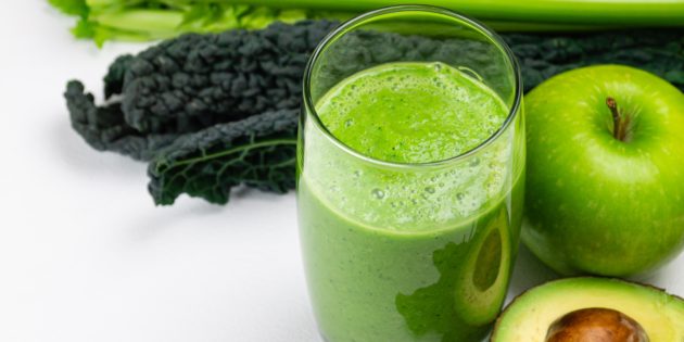 Healthy green smoothie and vegetables